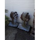 A pair of early 20thC cast metal roof air vents, 64cm H, 45cm W.