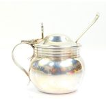 A Victorian silver mustard pot, of bulbous form, with blue glass liner, Elkington & Company,
