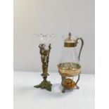 A Victorian glass and brass flower trumpet, the glass trumpet with a frilled rim, in a brass stand