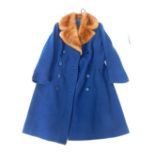A Portuguese mid 20thC lady's full length blue wool coat, with fur collar and lapels.