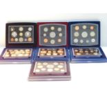 Royal Mint United Kingdom coin proof collections, 2001-2002, and 2004-2008. (7)