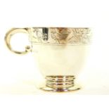A George V silver christening mug, engraved with a band of chickens, chicks and ducks, London