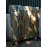 A mid 20thC painted metal five door sports locker, 184cm H, 152cm W, 31cm D.