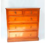 A Victorian mahogany chest of drawers, the bow fronted top raised over two short and three long