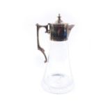 A cut glass claret jug, with silver mount, handle and hinged lid, London 2000, 27.5cm H.