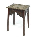 A Victorian oak side table, the rectangular top with carved scrolling leaf decoration, above