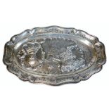An 18thC French pre-revolution pewter platter, of shaped oval design with scroll, scale and floral