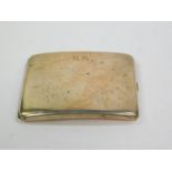 A George V silver cigarette case, of curvilinear form, initial engraved and dedicated internally,