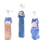 Three Lladro porcelain figures modeled as nuns, comprising a nun seated crocheting, a nun