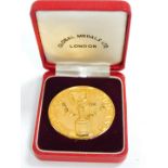 A Global Medals Limited World Cup 1966 commemorative medallion, gilt metal, the obverse showing
