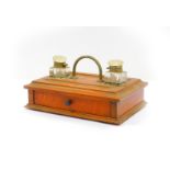 A Victorian oak and boxwood line inlaid desk stand, of rectangular section, with carrying handle and