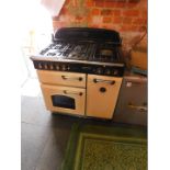 A Leisure cream painted gas range cooker Classic 90, with a six plate hob, double oven and grill,
