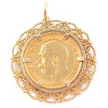 A George V gold half sovereign 1912, in a 9ct gold pendant mount, 7.0g.