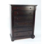 A Chinese Victorian style dark oak chest, with six long drawers flanked by demi pilasters, raised on