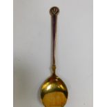 A Danish silver gilt and purple guilloche enamel salt spoon, bears hallmarks, 12.5cm L. (AF)