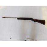 An air rifle, marked to the stock end PH England, patent numbers 997045, serial number G32452, 113cm