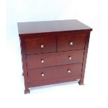 An Izziwotnot mahogany chest of drawers, with two short over two long drawers, raised on square legs