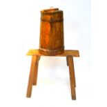 A Victorian pine and iron bound butter churn, 63cm H, with a pine stand, the rectangular top