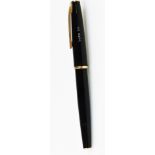 A Geha 715 fountain pen, in black and gilt trim with gilt clip, partially enclosed nib, 14cm W.