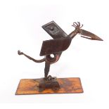 Andrew Thompson (British, 20th/21stC). A wrought iron sculpture of a pelican, modelled standing with