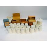 Three Emarco Undine irrigators, boxed, assorted ointment jars, printed to the lid John W Hall,