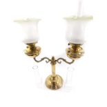 A Victorian style brass twin branch oil lamp candelabra, with glass chimneys and etched frosted