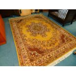 A Belgian wool Keshan super rug, decorated with a central floral medallion, in a surround of flowers