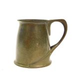 An Archibald Knox pewter tankard, no.066, possibly for Liberty and Co., with a hammered body and