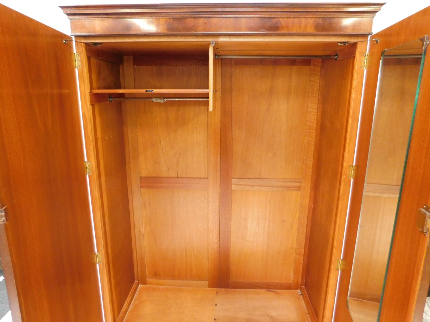 A Georgian style mahogany double wardrobe, the outswept pediment over two doors, opening to reveal - Image 3 of 3