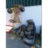 A go-cart frame, fairing pieces, various tyres and a bucket seat. (quantity)