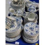 A Johnson Bros blue and white dinner and tea service, decorated in the Indies pattern, comprising
