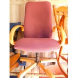 A Chairplan lilac fabric covered swivel office chair.