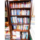 Books: light literature, health and general reference, hard and soft back. (5 shelves)