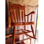 A pine rocking chair, 56cm W.