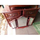 A pair of Castille rosewood bedside chests, of three drawers, raised on bracket feet, 55cm wide,