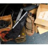 Two tilley lamps, an ammo box, electric coal effect fire, shoe cleaning brushes, first aid kit,