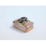 A silver pill box stamped 925, with a hinged lid, mounted with a frog set with marcasites and