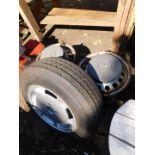 Five half JX15H2ET60 Mercedes-Benz wheels, with plastic Mercedes-Benz hub caps, together with an