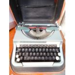 An Imperial Good Companion typewriter, cased.