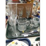 A pair of Stuart Crystal champagne flutes, decorated in the Millennium pattern, a pair of cut