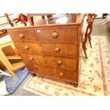 A William IV mahogany chest, of two short over three long graduated drawers, raised on turned