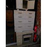 A grey painted pine bedroom suite, comprising a chest of two short and two medium drawers over two