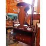 A Stag 1970's mahogany bedside chest, an oak oval occasional table magazine rack, metal three tier