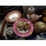 A Satsuma pottery part coffee service, comprising coffee pot, cream jug, three cups and saucers,