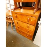 A mid 20thC oak chest, of four long drawers, raised on a plinth base, 98cm H, 68.5cm W, 43.5cm D.