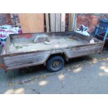 A car trailer, metal framed and wood panelled, with two additional wheels, 177cm W, 280cm L.