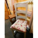 A turquoise painted wooden ladder back chair, with solid pine seat and loose tied cushion.