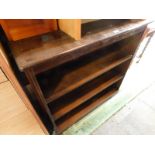 An oak open bookcase, of two shelves, raised on bracket feet, 94cm H, 97cm W, 25.5cm D.