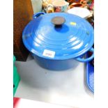 A Le Crueset blue enamel casserole pot and cover, 30cm diameter.
