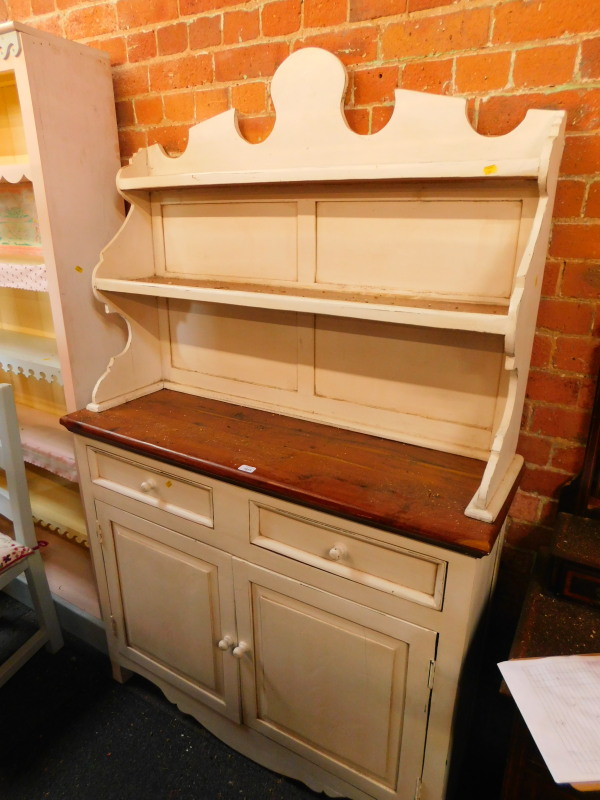 A mango wood and painted kitchen dresser, with open galleried rack, above two drawers and two